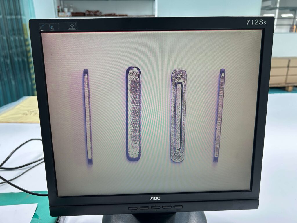 Magnified Inspection of Stamped Metal Strips