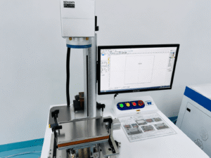 Industrial laser engraving machine used for precision marking of custom metal parts, including logos, text, and permanent identification marks.