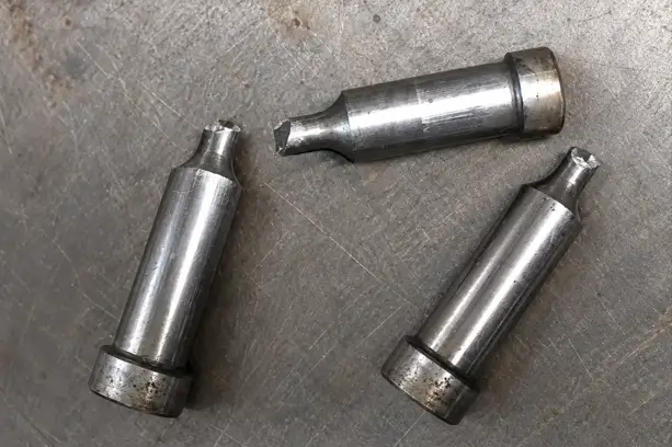 Broken punch pin showing fracture at the working section in a stamping die