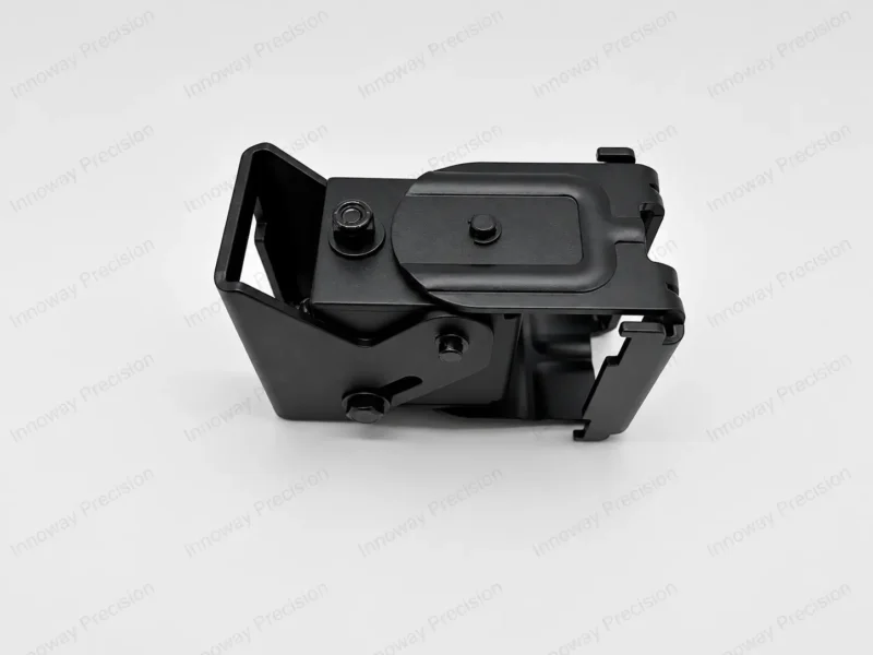 Adjustable Monitor Wall Mount Bracket – Joint Details Close-up of an adjustable monitor wall mount bracket showing the pivot connection, fastening bolts and formed metal housing.