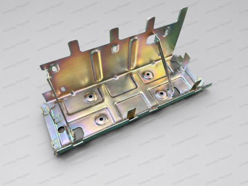 Custom Riveted Sheet Metal Bracket Assembly Custom SPCC sheet metal bracket assembly with stamped components, riveted joints and iridescent zinc plating.