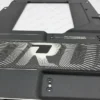 Precision Laser Engraving on Black Powder-Coated Aluminum Close-up of laser-engraved metallic graphics on a black powder-coated aluminum motherboard panel.