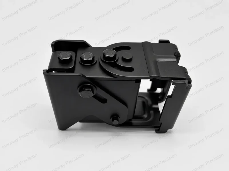 Monitor Wall Mount Bracket – Angle Adjustment Mechanism Custom monitor wall mount bracket with curved adjustment slots, pivot bolts and black-finished metal components.
