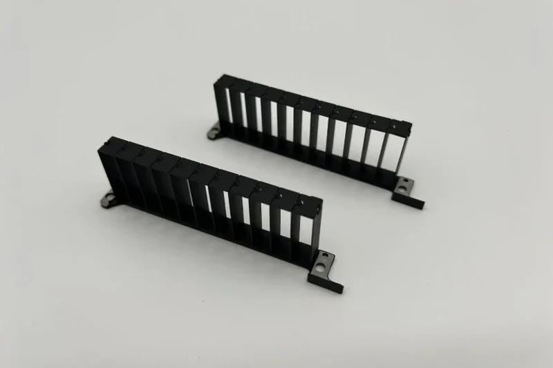Stamped GPU zipper fin heatsink with mounting brackets and cooling fins